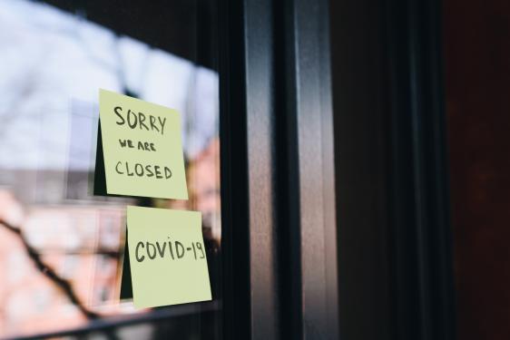 Post its on door, "Sorry we are closed" and "COVID-19"
