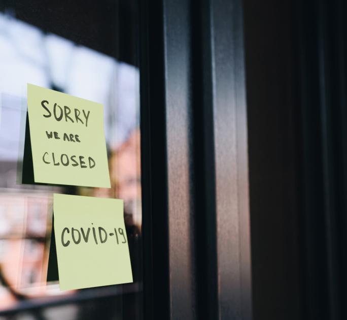 Post its on door, "Sorry we are closed" and "COVID-19"